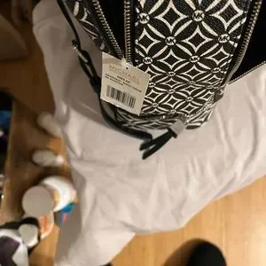 Michael Kors Backpack 9 1/2”W X 12 1/2”H X 2 1/2”D MICHAEL KORS Dallas Medium Signature Logo Backpack-Vanilla  main image 3